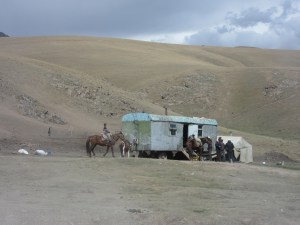 Nomads with yurts in the high pastures